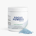 Container of Focus Powder by Rejuvrx with powder spilling out on a white background