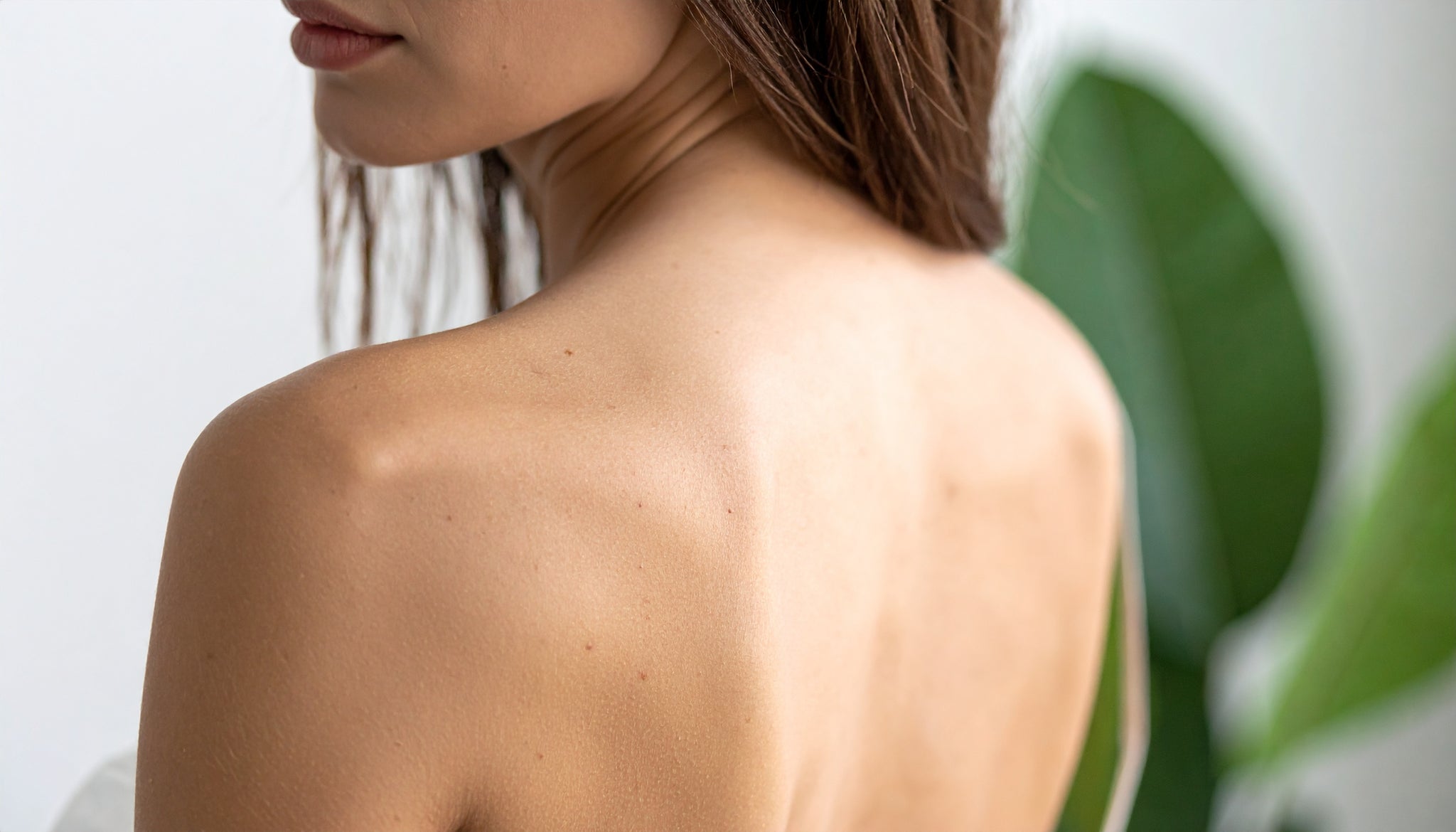 Partial view of a person with a blurred background