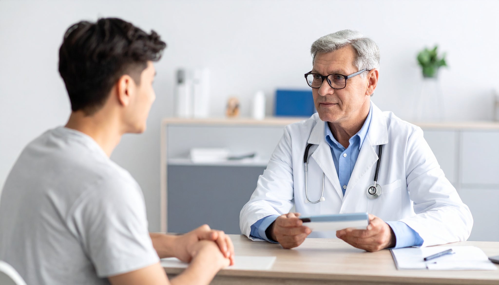 Doctor and patient in a medical consultation setting